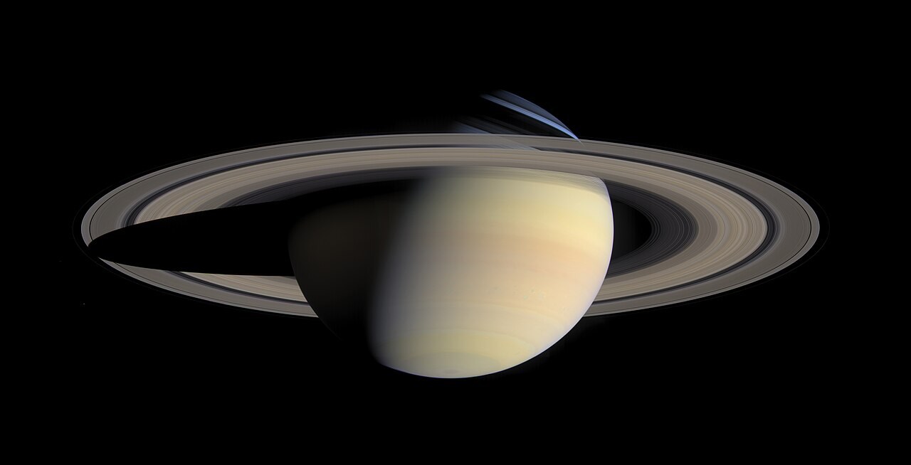 Saturn and its broad rings in a natural-colour mosaic photographed by the Cassini spacecraft.