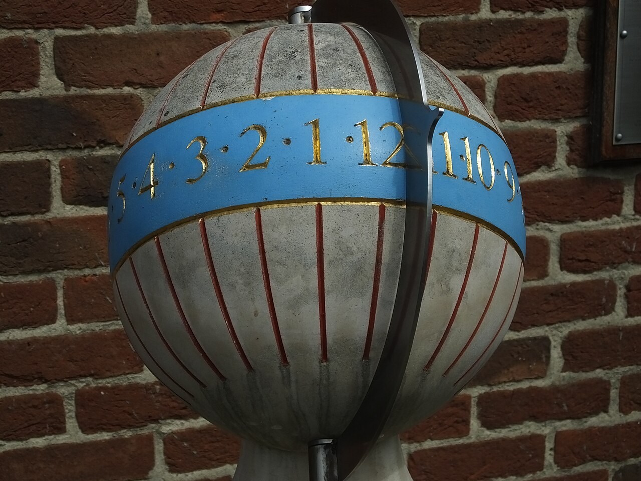 A spherical sundial with hour markings and a movable gnomon at Green's Windmill, Nottingham.
