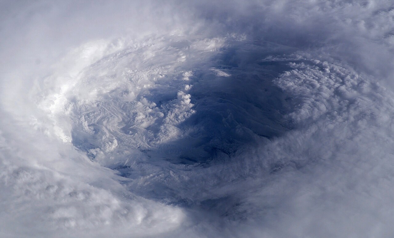 The clear eye and tall spiral cloud walls of Hurricane Isabel, photographed from the ISS.