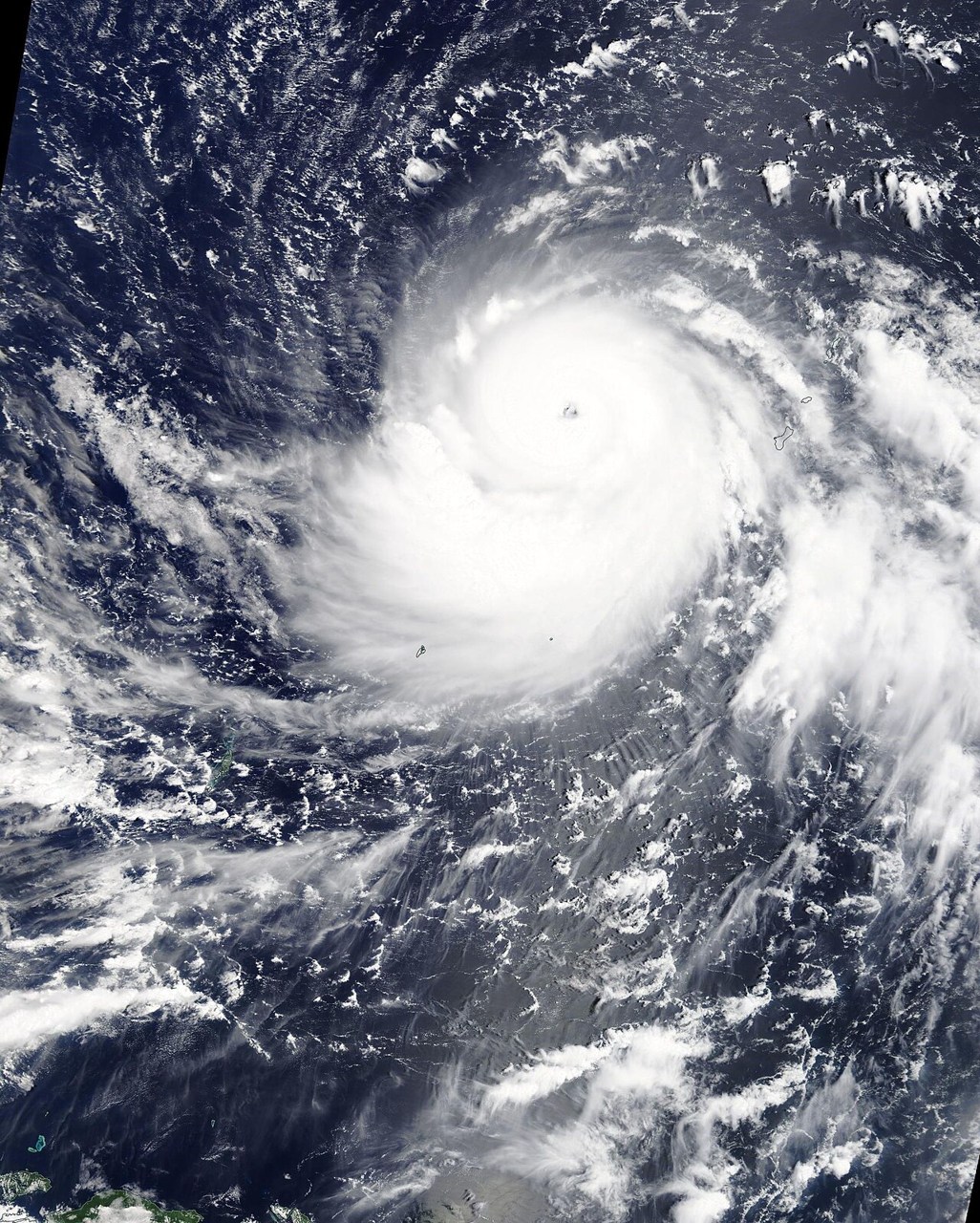 Satellite view of Typhoon Mangkhut with a compact eye and spiralling cloud bands in September 2018.