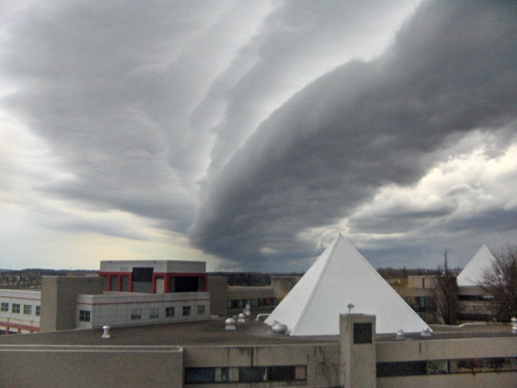 A low shelf cloud sweeps over buildings at Brock University in Ontario.