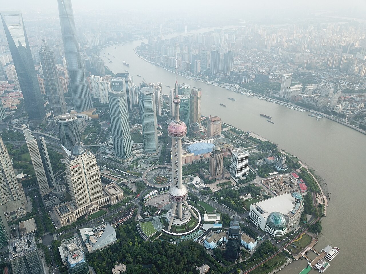 The Huangpu River curves around Lujiazui's towers in Shanghai.
